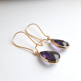 Violet earrings.