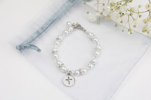 White pearl cross bracelet